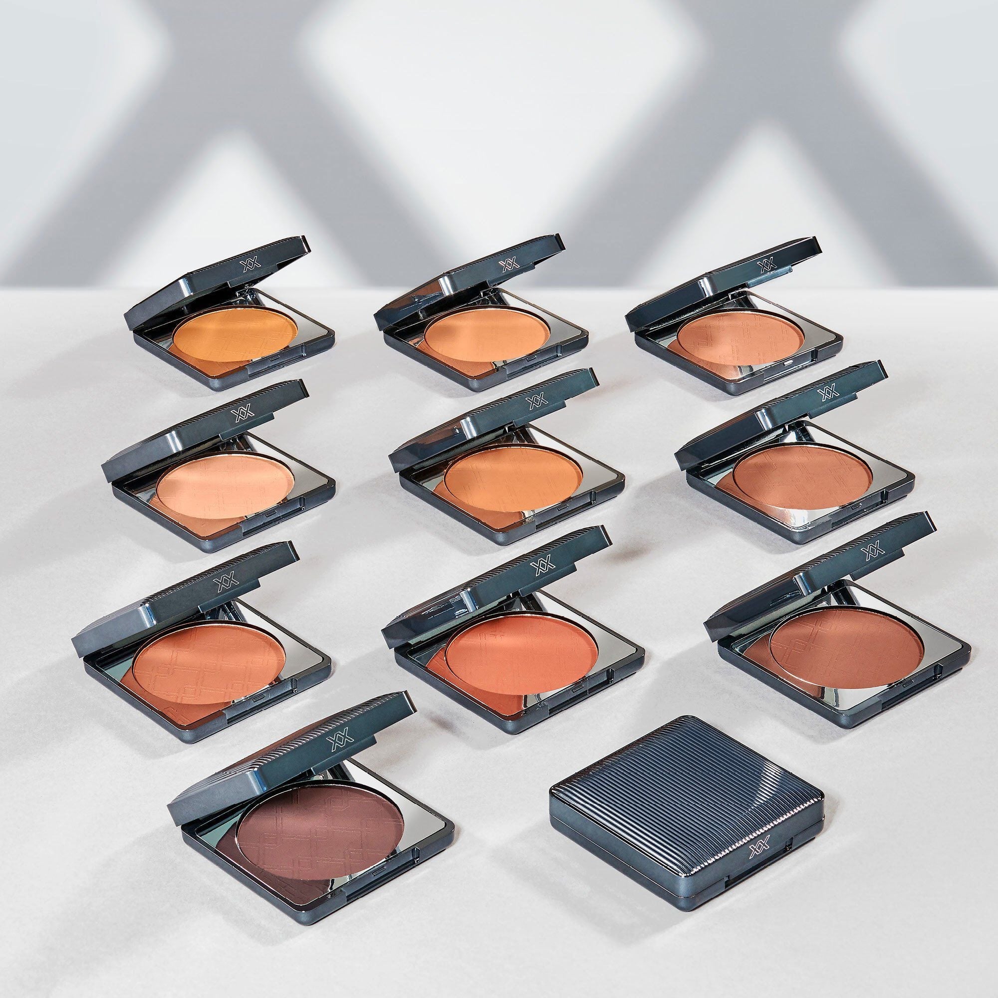 XX REVOLUTION XX BRONZER XX REVOLUTION XX BRONZER